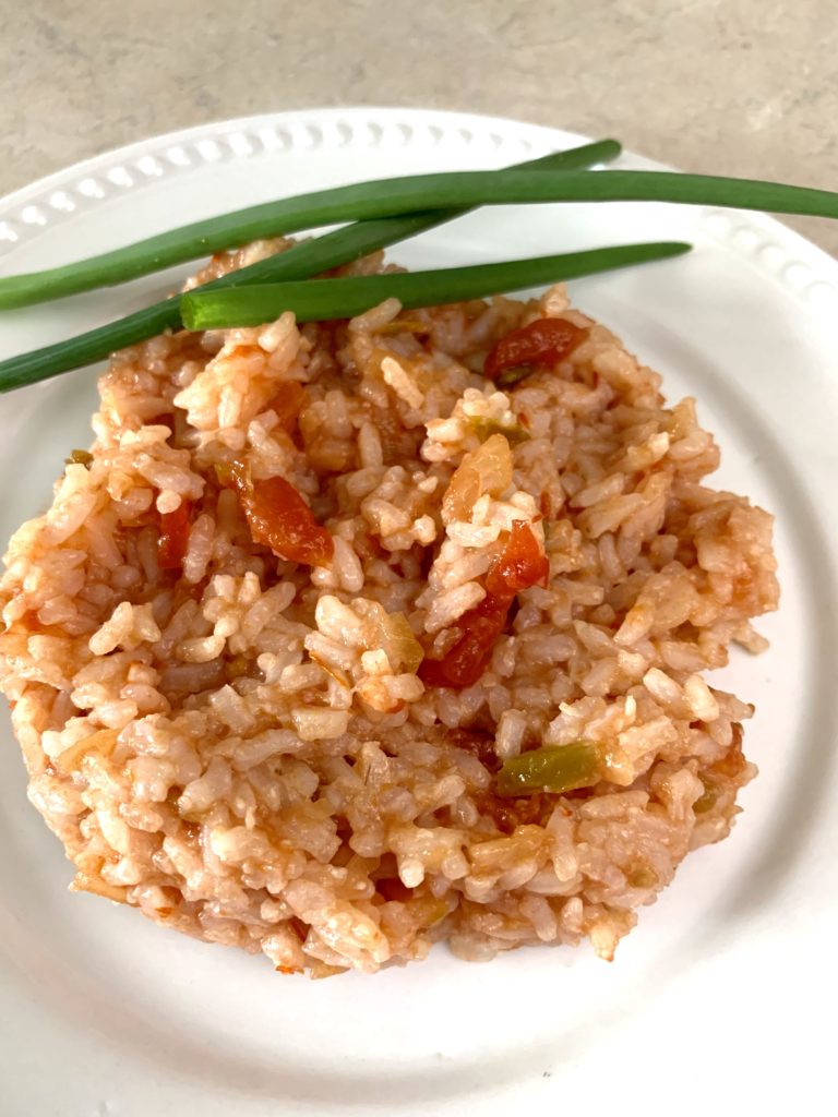 Spanish rice on a white plate