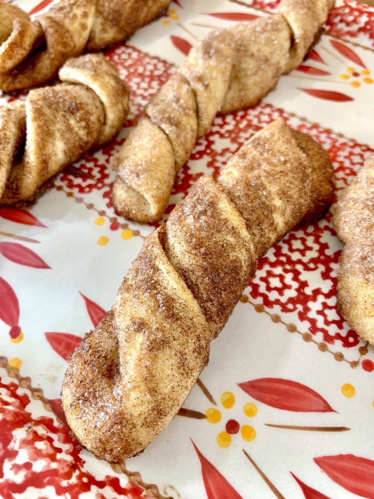 cinnamon twists on a red and white plate
