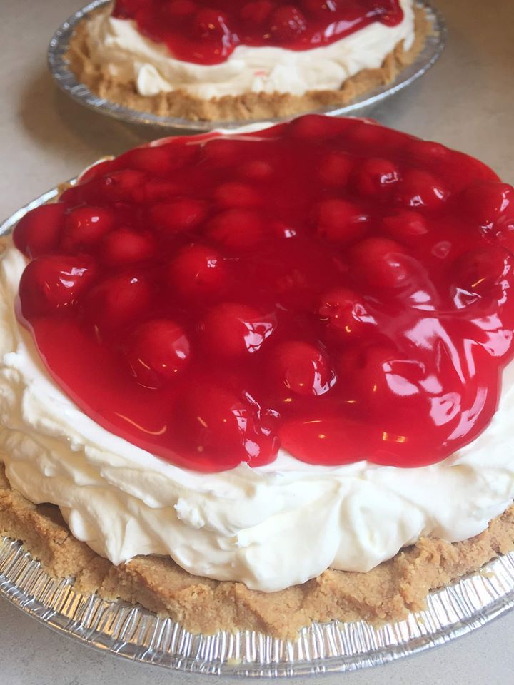 2 keto cherry pies on a white countertop