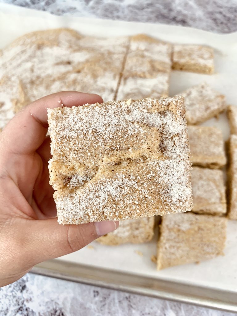 hand holding a snickerdoodle cookie bar