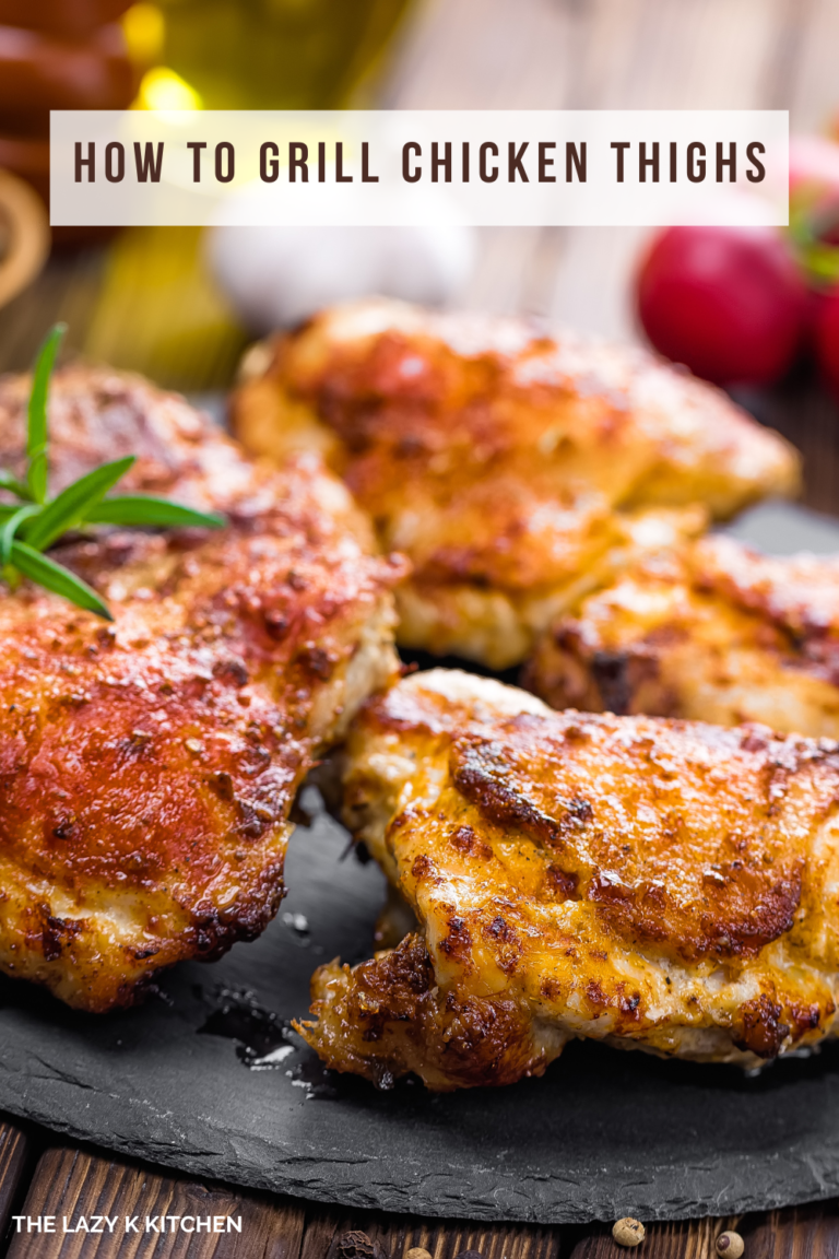 Pinterest pic of grilled chicken thighs on a black plate