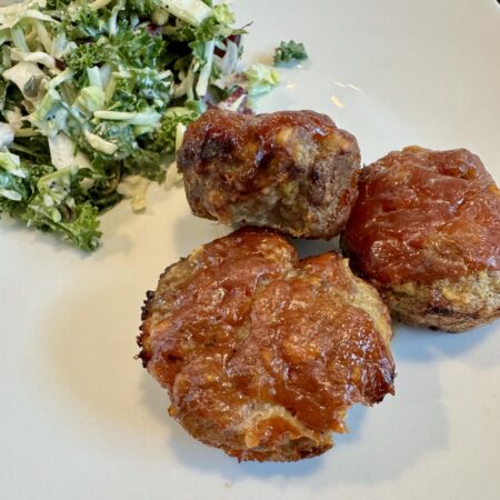 mini meatloaves on a white plate