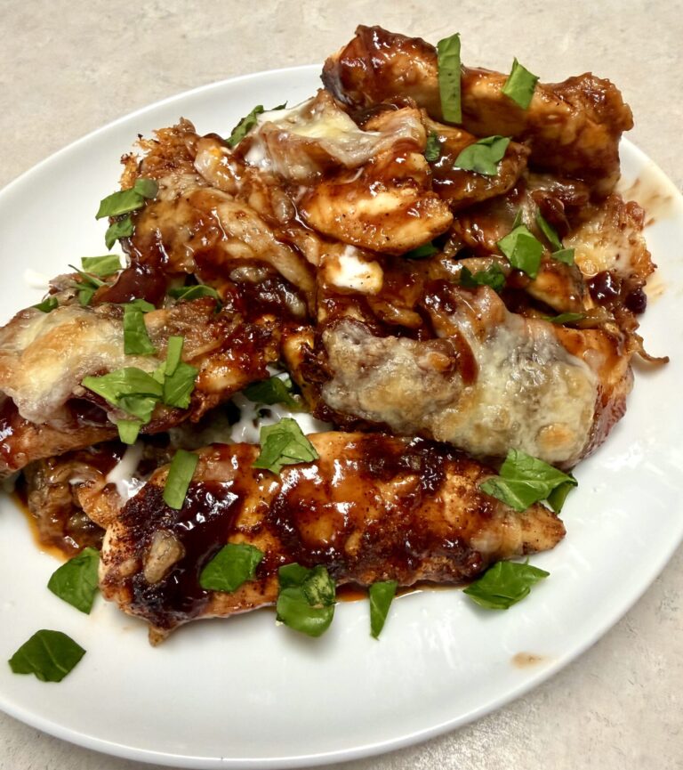 BBQ chicken on a white plate