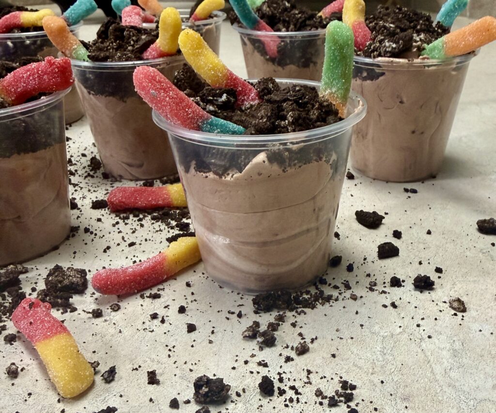 dessert cups of crushed Oreos and candy