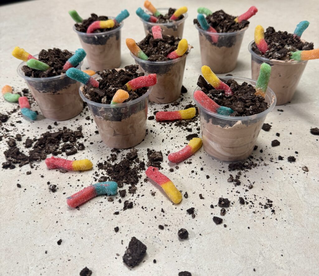 dessert cups of crushed Oreos and candy