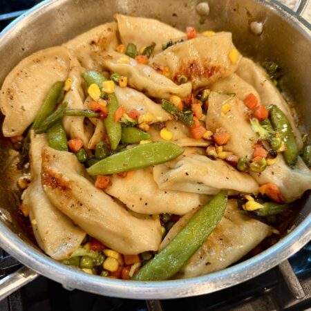 potsticker stir fry in a skillet