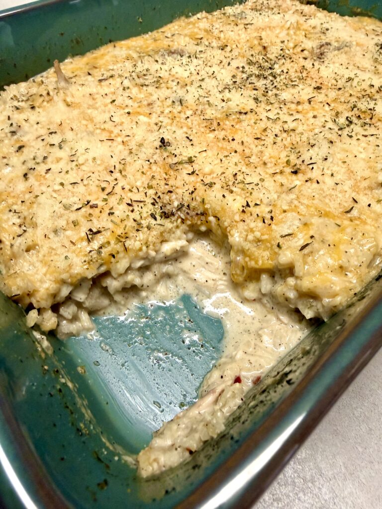 pic of chicken alfredo rice casserole in a baking dish