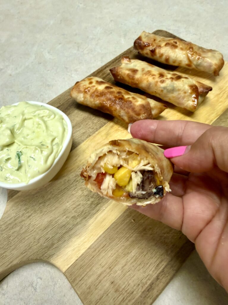 hand holding Southwest egg rolls