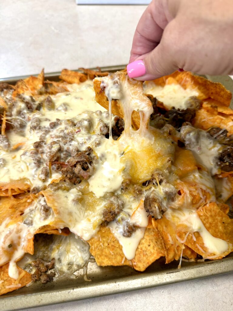 Picture of sheet pan nachos on a baking sheet pan.