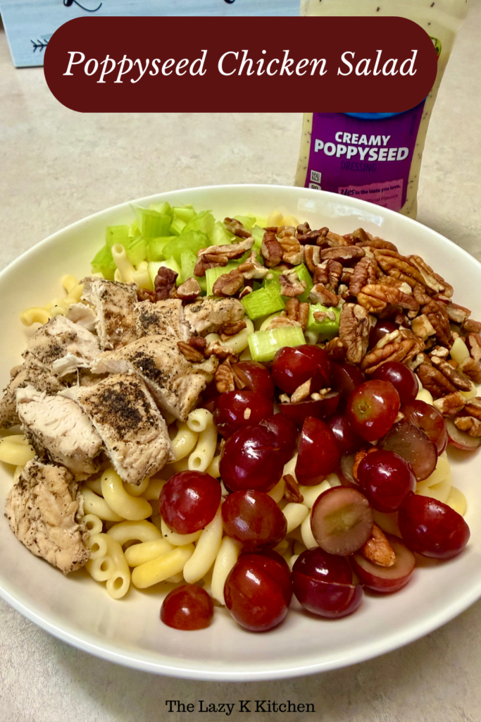 Pinterest Picture of poppyseed chicken salad in a white bowl.