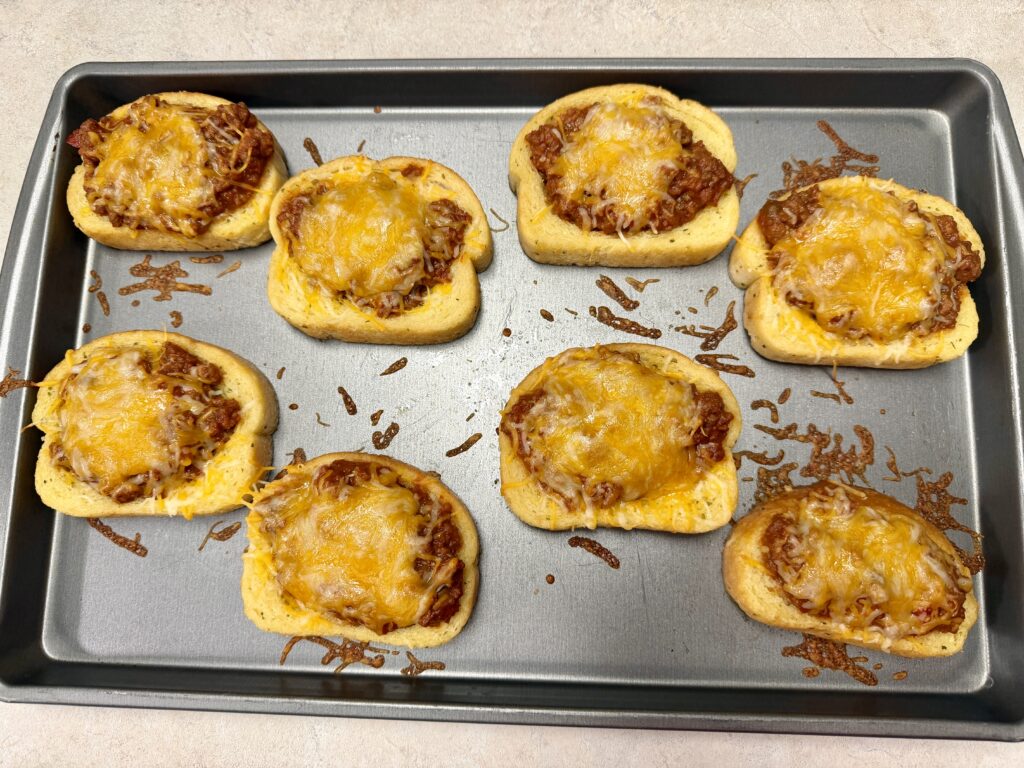 Picture of 4 ingredient Texas toast sloppy joes on a baking sheet pan.