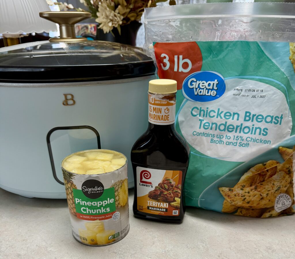 a crockpot and the ingredients for the teriyaki chicken