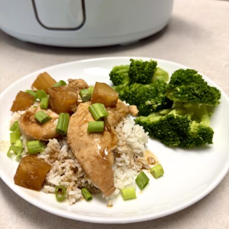 chicken and broccoli on a white plate