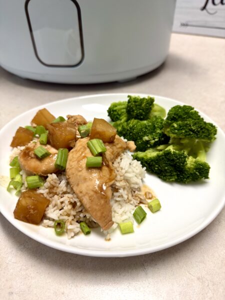 chicken and broccoli on a white plate