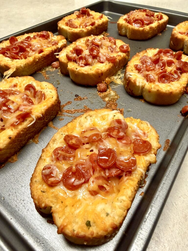 pepperoni pizza Texas toast on a baking sheet