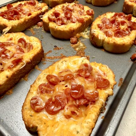 pepperoni texas toast on a baking sheet