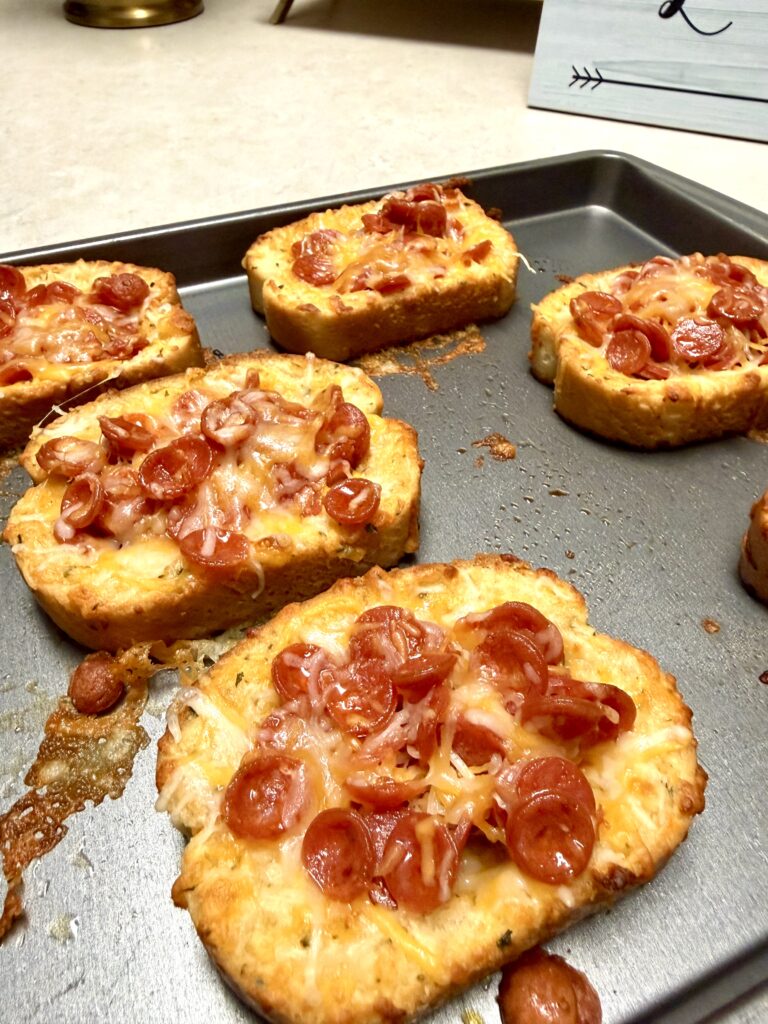 pepperoni pizza Texas toast on a baking sheet