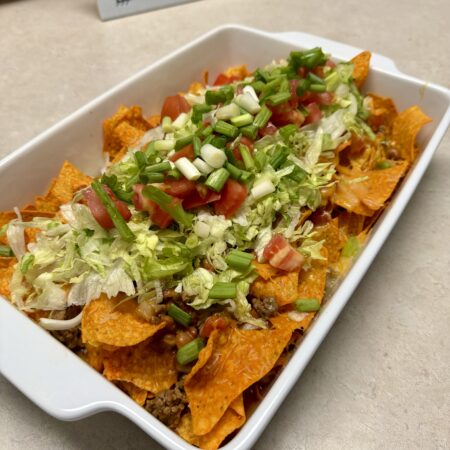 walking taco in a white baking dish