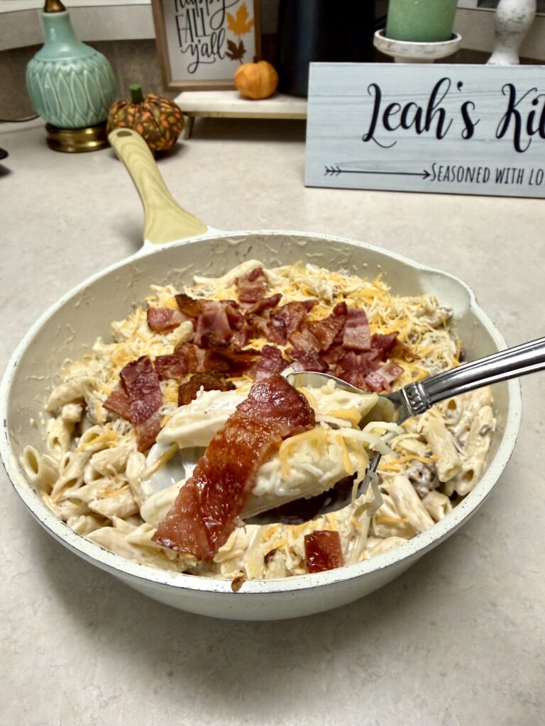 pasta meal in a white skillet