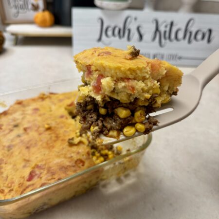 taco cornbread bake with a slice on a spatula